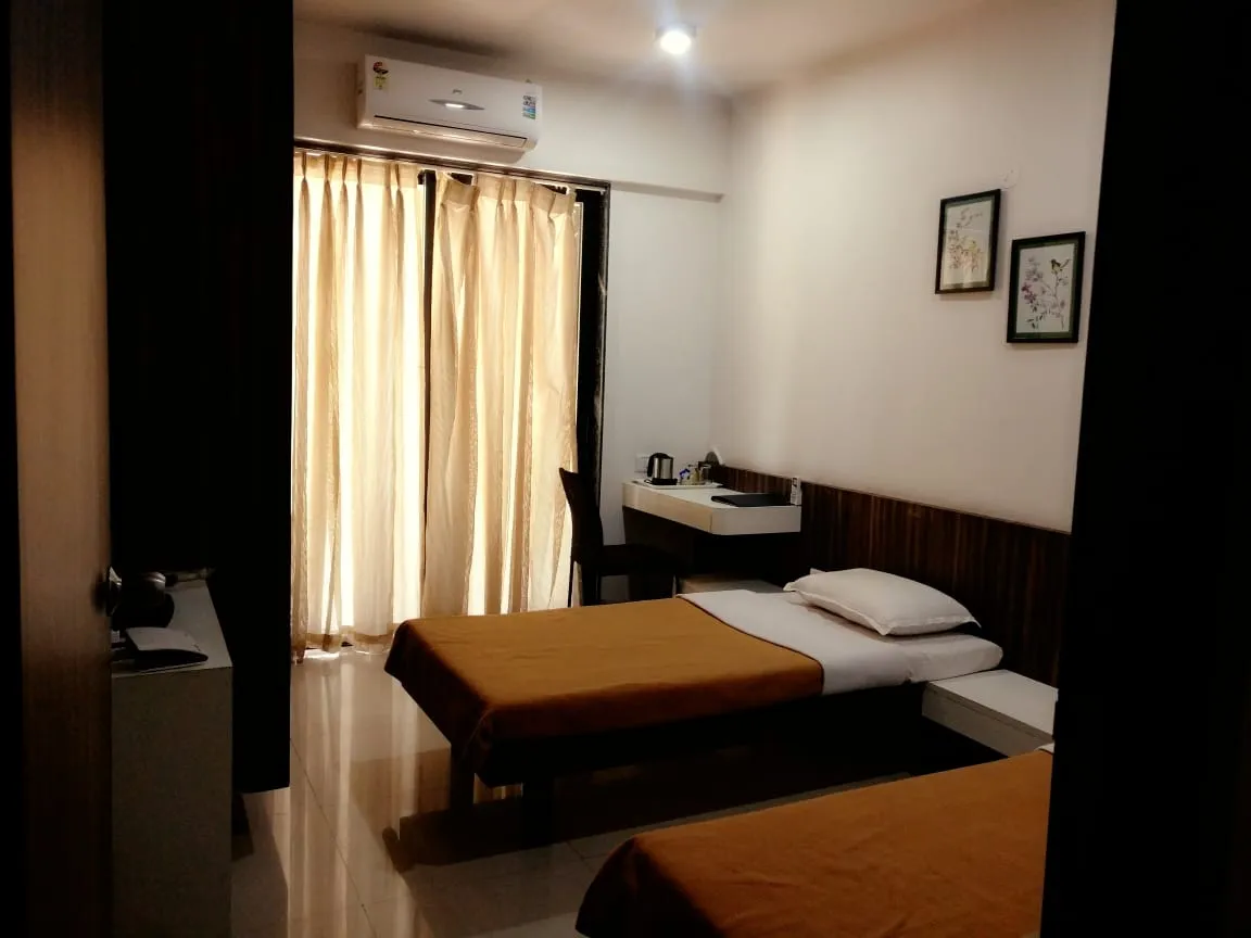Aashiyana Service Apartment bedroom